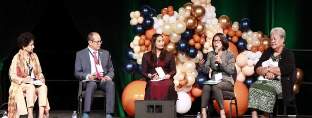 Image of 4 prominent persons with Prof Asha Kanwar during panel discussion