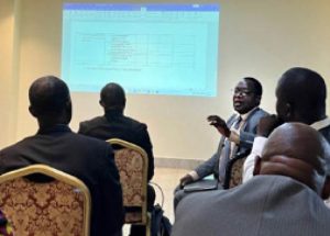 Participants listening the presentation