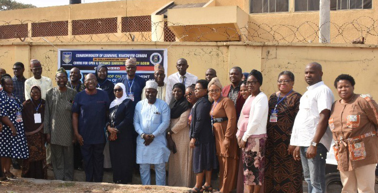 Workshop participants posing for a group photograph